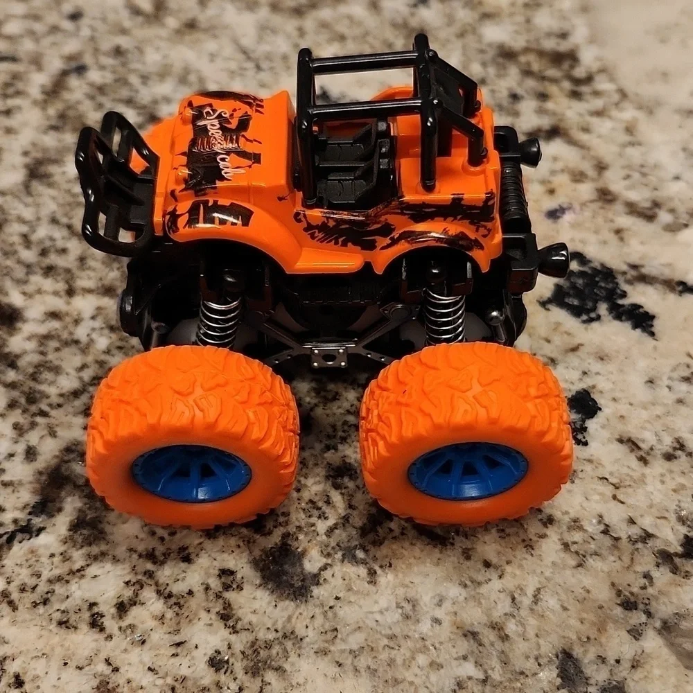 Jeep monster truck reve up car orange black